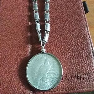 Silver dollar pendant and sterling silver necklace
